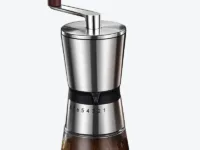 Découvrez le moulin à café manuel Gingira, un broyeur portable en acier inoxydable avec noyau en céramique, réglable jusqu’à 8 vitesses. Idéal pour expresso, filtre ou presse française.