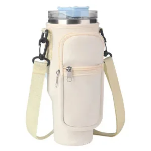 Transportez votre bouteille Stanley 40 oz en toute sécurité avec ce sac de transport robuste en néoprène, doté d'une poche pour téléphone et d'une sangle réglable. Idéal sport, randonnée, quotidien. Livraison offerte dès 10€