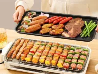 Profitez d'une cuisson saine et sans fumée avec le barbecue électrique DMWD 1500W. Idéal pour les brochettes, rôtis et Teppanyaki. Plaque antiadhésive, gril rotatif, collecteur d'huile.