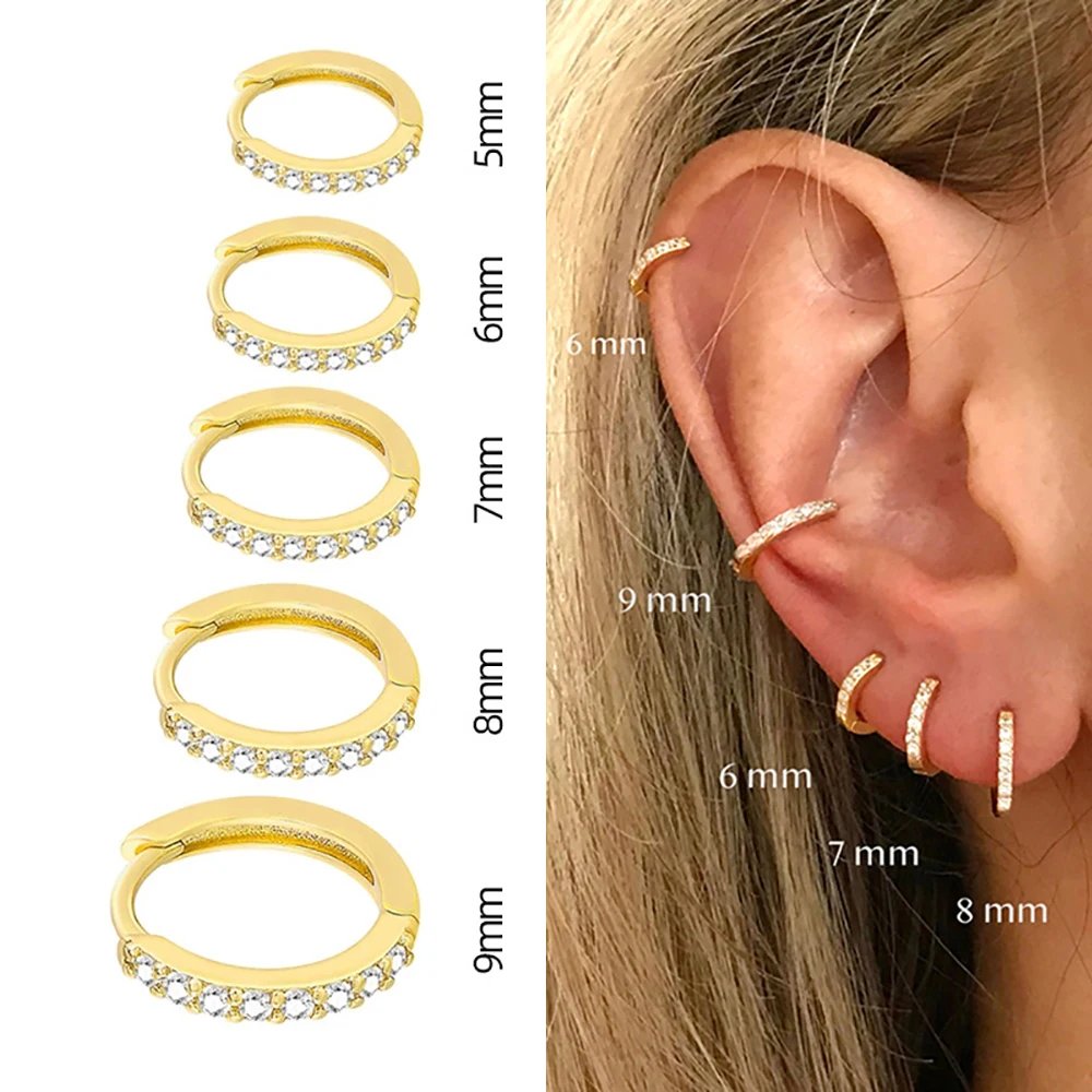 Boucles d’Oreilles Créoles Huggie en Acier Inoxydable – Zircone Élégante Or & Argent, Minimal Chic Cartilage 1 Boucles d’oreilles créoles Huggie en acier inoxydable avec zircone brillante. Élégance minimaliste en or ou argent, parfaites pour cartilage et piercing.