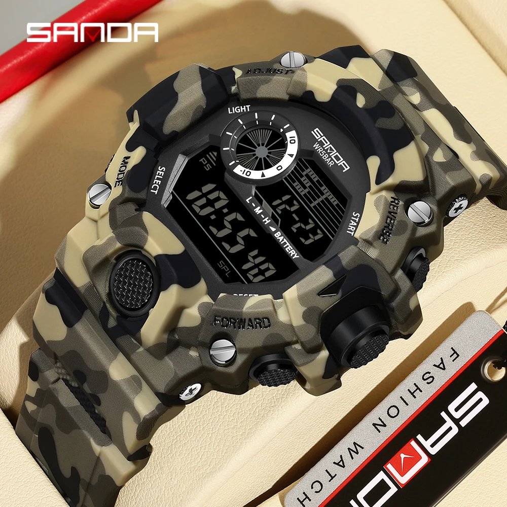 Montre Électronique Homme SANDA Camouflage Militaire – Montre Digitale Étanche Multifonction Liv. rapide 1 Montre électronique homme SANDA 218 camouflage militaire étanche 5Bar avec chronographe, LED et calendrier. Montre digitale robuste idéale sport et outdoor.